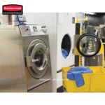 Laundry washing machine used for commercial uniform cleaning in industrial laundry facilities.