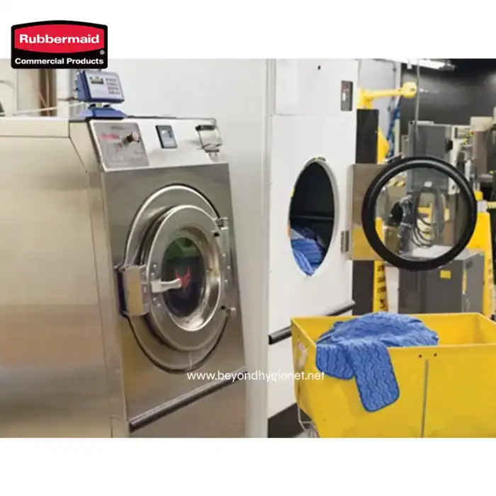 Laundry washing machine used for commercial uniform cleaning in industrial laundry facilities.