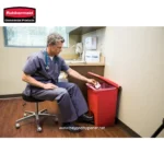 Disinfection of medical waste in a healthcare setting using Rubbermaid waste container for sanitation and safety.