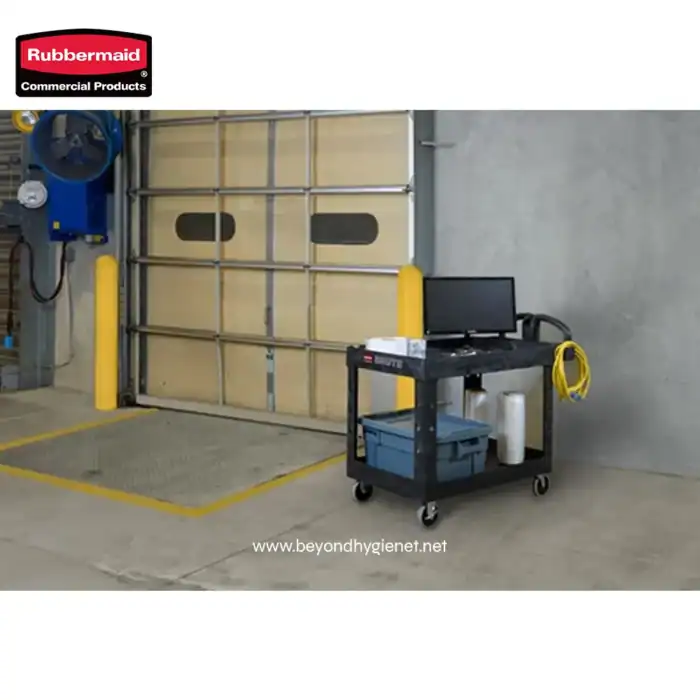 Rubbermaid commercial cleaning equipment setup in industrial warehouse setting.