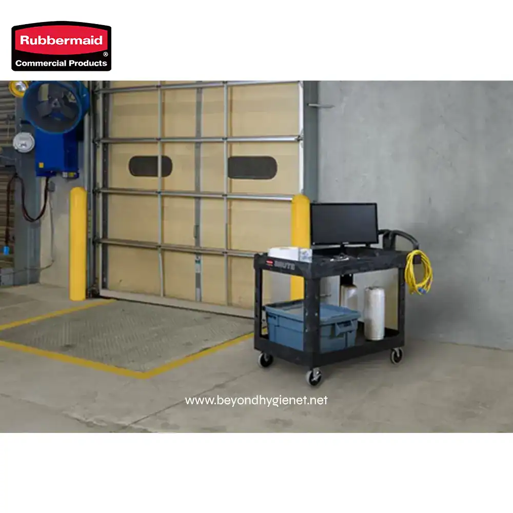 4 Rubbermaid commercial cleaning equipment setup in industrial warehouse setting.