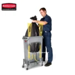 Rubbermaid commercial waste disposal system with a foot pedal opening and a large trash bag.