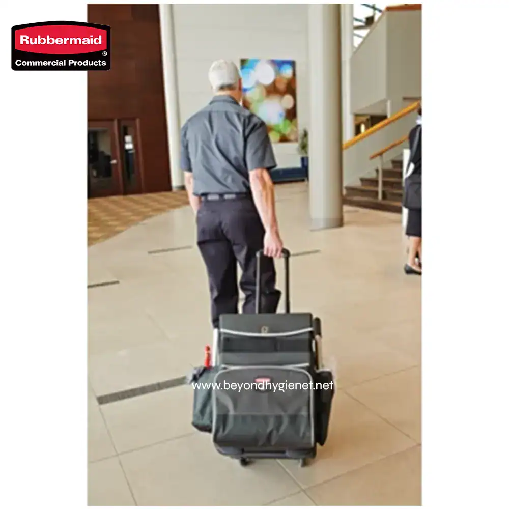 5 Black rolling suitcase being pulled by a man in an airport terminal, with a focus on luggage and travel essentials.