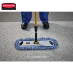 Rubbermaid floor cleaning mop with microfiber pad, used for commercial and industrial floor maintenance, showcasing durable cleaning equipment ideal for hygiene-focused environments.