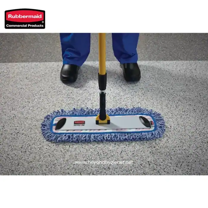 Rubbermaid floor cleaning mop with microfiber pad, used for commercial and industrial floor maintenance, showcasing durable cleaning equipment ideal for hygiene-focused environments.