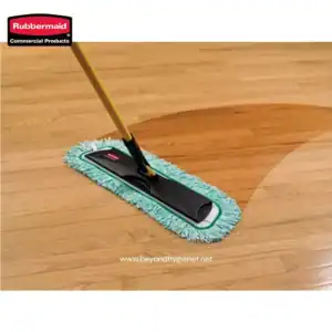 Microfiber mop cleaning hardwood floor for commercial cleaning services in Asia.