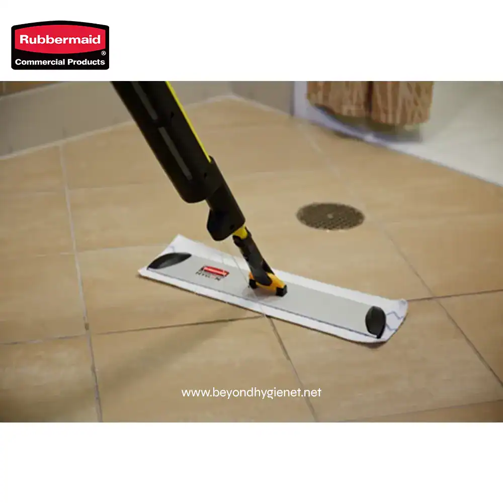 5 Rubbermaid cleaning product on tiled floor with drain in background, ideal for commercial cleaning and hygiene solutions.