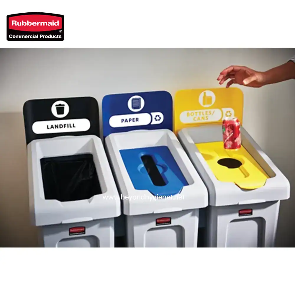 5 Landfill, paper, and bottles/cans recycling bins for waste separation in an eco-friendly waste management station.