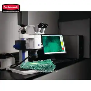 Rubbermaid commercial microscope with digital analysis screen in a clean laboratory setting.
