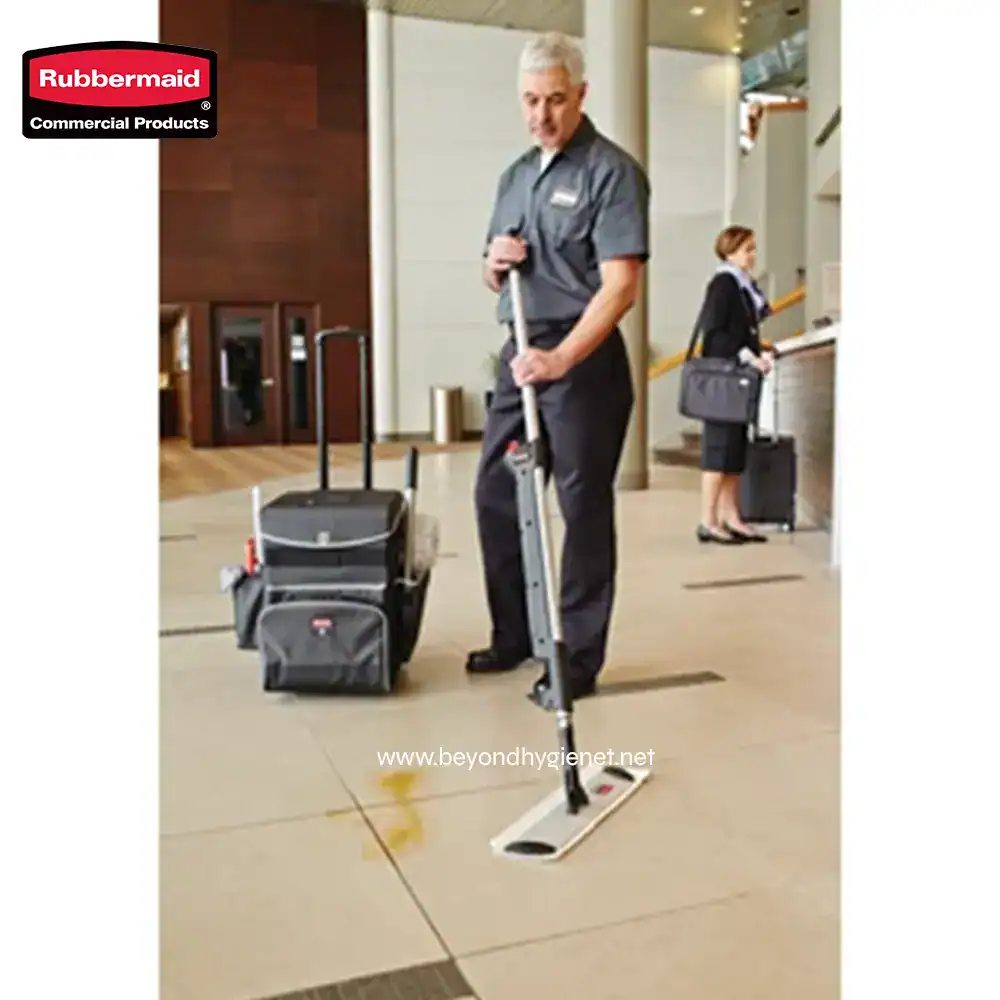 6 Cleaning staff using rubbermaid commercial cleaning equipment at Beyond Hygiene Asia workplace.
