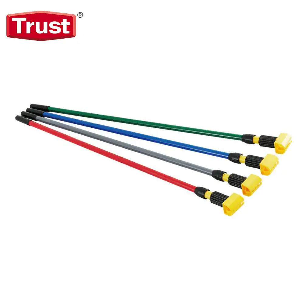 6321-6323 Polyvinyl alcohol floor cleaning tool with colored handles and yellow scrapers for commercial hygiene applications.