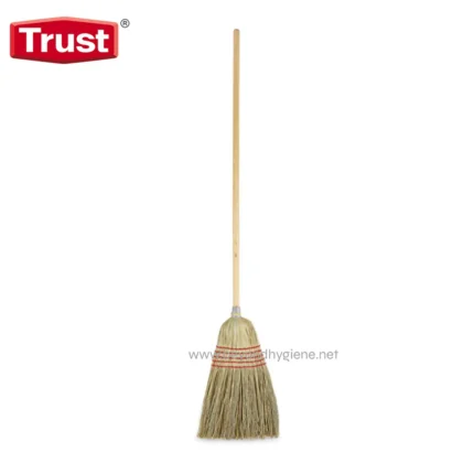 Broom with long wooden handle and straw bristles, ideal for cleaning floors in commercial and residential spaces for hygiene and sanitation purposes.