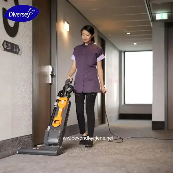Efficient commercial carpet cleaning using a professional industrial vacuum cleaner at Beyond Hygiene Asia. Perfect for maintaining clean, hygienic environments in hospitality and corporate spaces.
