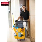 Professional cleaning staff with janitorial cart in a commercial building environment cleaning and disinfecting services for hygiene and sanitation in Asia.