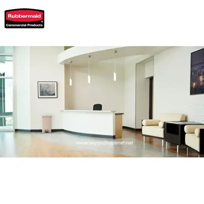 Clean modern hotel lobby reception area with white walls, black and beige furniture, and ceiling pendant lights, emphasizing hygiene and first impression cleaning services in Asia.