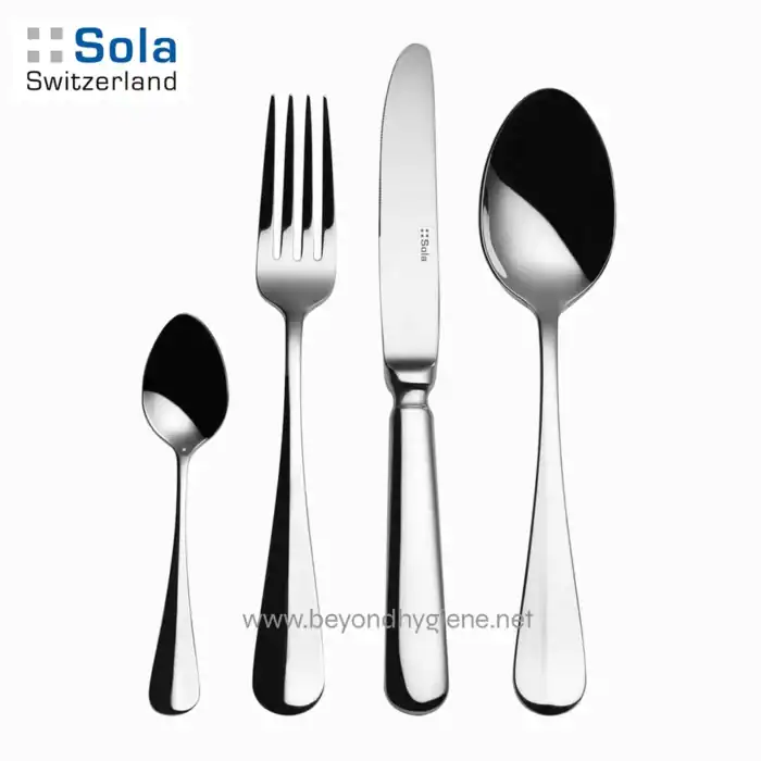Polished stainless steel cutlery set including fork, knife, spoon, and teaspoon for dining hygiene and elegance. Suitable for restaurants, hotels, and home use.