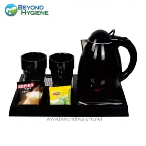 Electric kettle with tea cups, coffee, and tea sachets on a serving tray, promoting hygiene and hospitality for Asian markets.