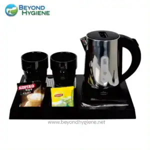 Hot water kettle with tea and coffee setup for office break room in Beyond Hygiene Asia, catering to sanitation and hygiene solutions in Asian workplaces, with tea, coffee, and kettle essentials for employee refreshment.