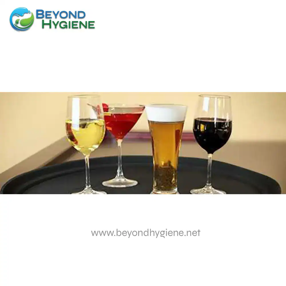FASTFOOD TRAY2 Wine glasses containing various beverages for sanitation and hygiene in hospitality settings.