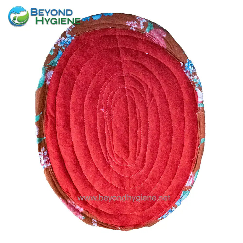 Floor Mat 2 Red floral quilted oval bath mat with non-slip backing for bathroom safety, enhanced cleanliness, and spa-inspired comfort. Perfect for hygienic bathroom decor and absorbing moisture.