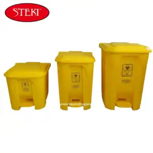 Yellow biohazard waste bins for medical and healthcare safety disposal.