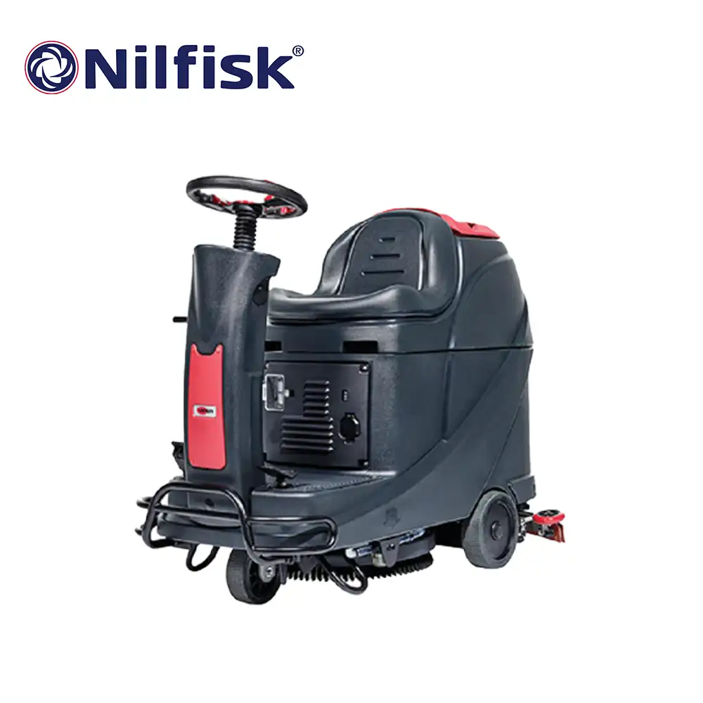 NILFISK MINI SCRUBBER RIDE ON MACHINE 21 INCHES 24V Nilfisk industrial floor cleaning machine for warehouse and commercial cleaning applications.