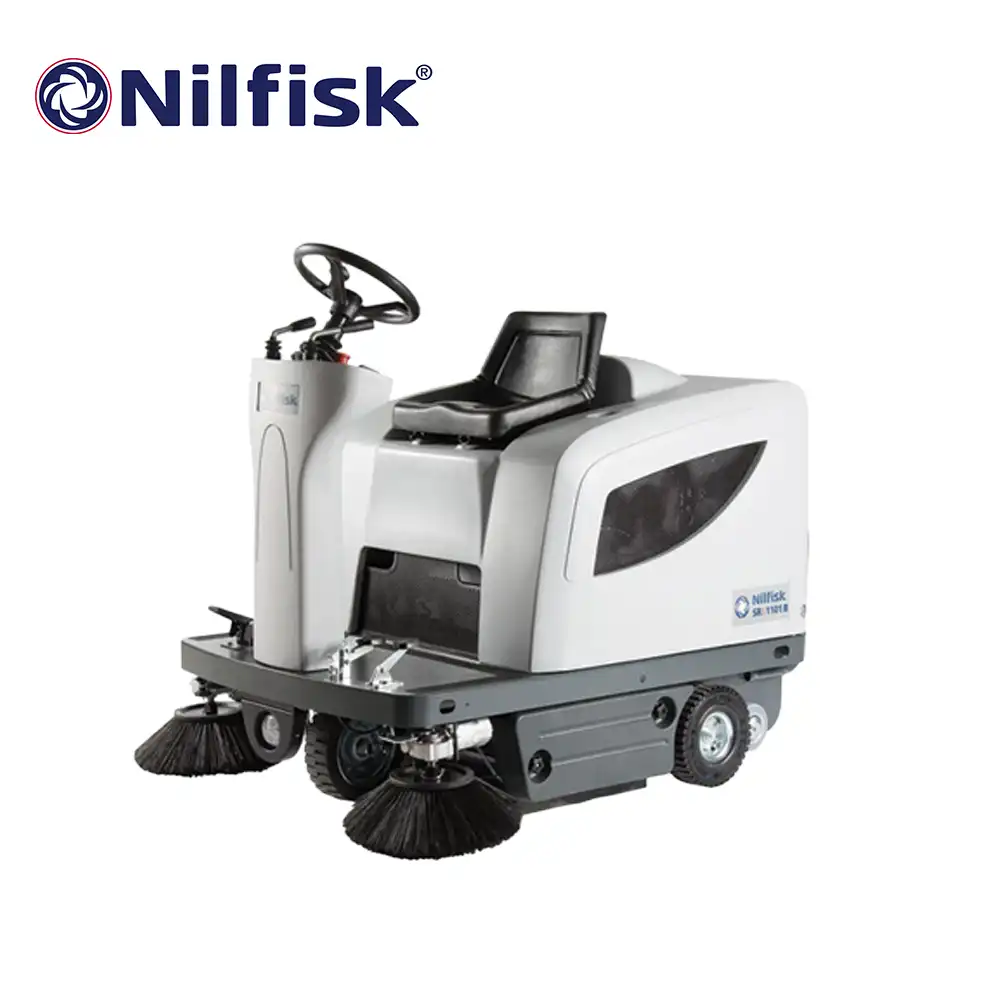NILFISK SWEEPER RIDE-ON 9084310010 Nilfisk floor cleaning machine with brushes, designed for industrial and commercial sanitation solutions, ideal for improving hygiene standards in various Asian facilities.
