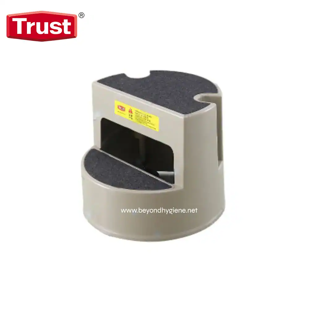 Trust branded step stool with anti-slip surfaces, ideal for safe access in commercial and public hygiene environments. Durable and easy to clean to maintain sanitation standards.