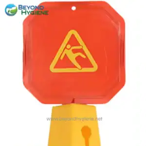 Warning wet floor slip hazard caution sign in bright yellow and red, used for safety at workplaces and public spaces to prevent accidents, emphasizing hygiene and safety standards in Asia.