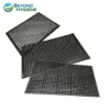 Black perforated rubber mats for hygiene and industrial purposes at Beyond Hygiene Asia.
