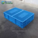 Blue plastic pallet used for heavy-duty industrial and warehouse logistics, designed for durability and easy handling, suitable for shipping and storage in commercial facilities.
