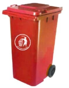 Red waste disposal bin with lid and wheel for trash collection and sanitation services in Asia.