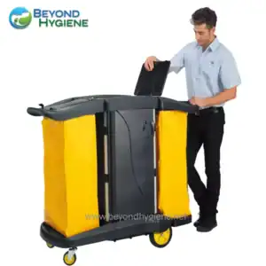 Storage and cleaning cart with yellow disposal bags for industrial hygiene supplies.