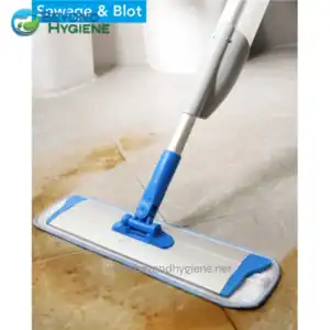Microfiber mop cleaning floor for commercial hygiene maintenance.