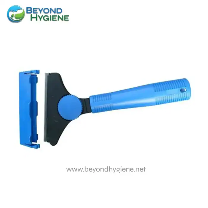 Reusable razor with blue handle and replaceable blade for hygiene and grooming needs. Suitable for personal and professional use, ensuring clean and safe shaving experiences.