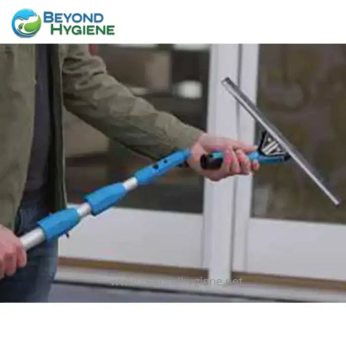 Disinfecting window with cleaning tool, outdoor sanitation, professional hygiene practices, Beyond Hygiene Asia, commercial cleaning service.
