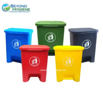 Blue recycling bin for waste segregation and disposal.