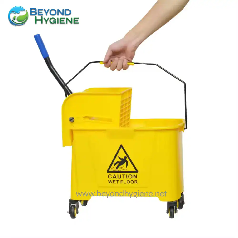 UGA068-2 Yellow wet floor cleaning mop bucket with caution sign and wringer for professional hygiene and sanitation.