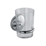 Clear glass tumbler with stainless steel wall mounted holder, ideal for hygienic bathroom and kitchen use. Durable, stylish, and easy to clean for enhanced hygiene and convenience.