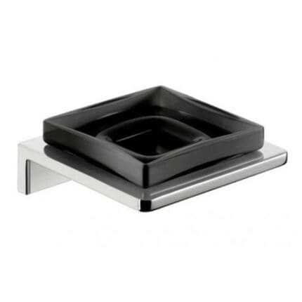 Black ceramic soap dish on a stainless steel holder, modern bathroom accessory, used for holding soap, sleek design perfect for upscale hygiene and sanitation solutions.