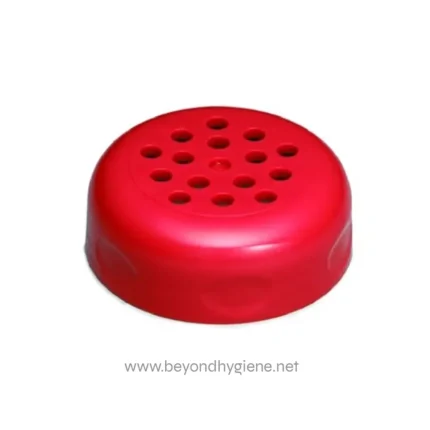 Red rubber soap holder with drainage holes for bathroom or kitchen cleaning accessories.