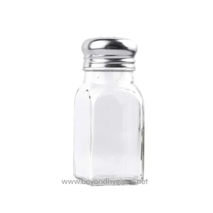 Salt shaker empty clear glass container with metal lid, used for seasoning food in dining settings. Perfect for restaurants and hospitality hygiene standards.