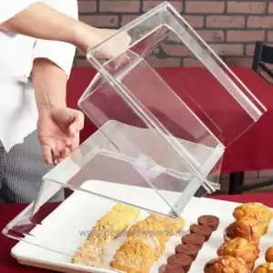 Disposable acrylic food display case for bakery and dessert presentation.