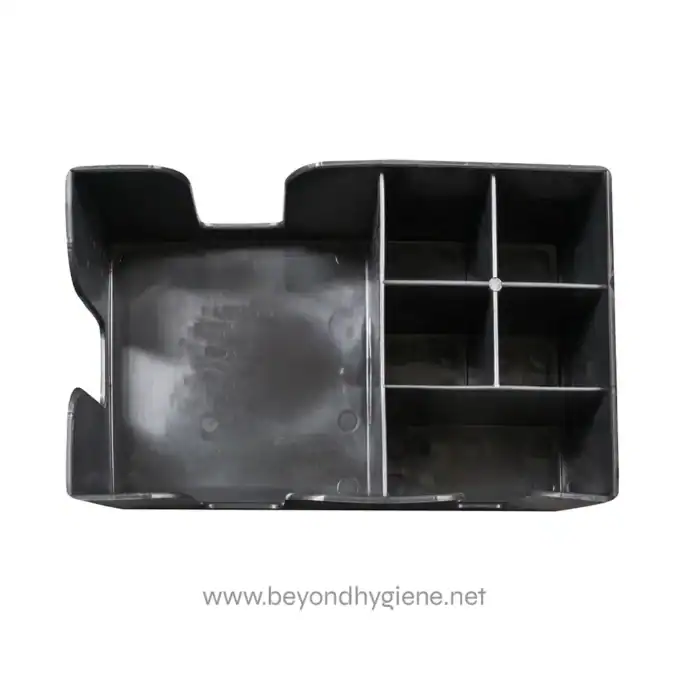 Stainless steel organizer tray with multiple compartments, ideal for hygiene and sanitation supplies storage, used in healthcare, cleaning, and food service industries.