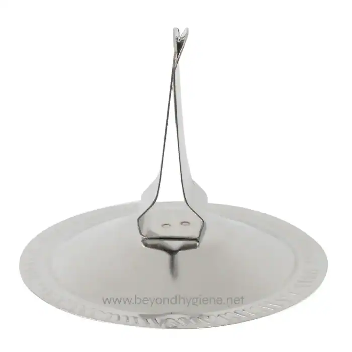 Stainless steel tongs resting on a white disposable plate, used for hygienic food handling and service in Asia.