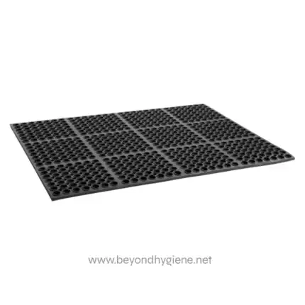Flexible vinyl indoor-outdoor multipurpose floor mat with drainage holes, ideal for commercial hygiene and sanitation purposes in Asia.