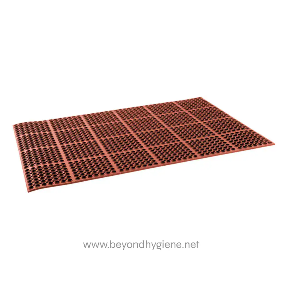 1835239 Red anti-slip rubber mat with drainage holes for industrial and commercial use, enhancing safety and hygiene in workplaces.