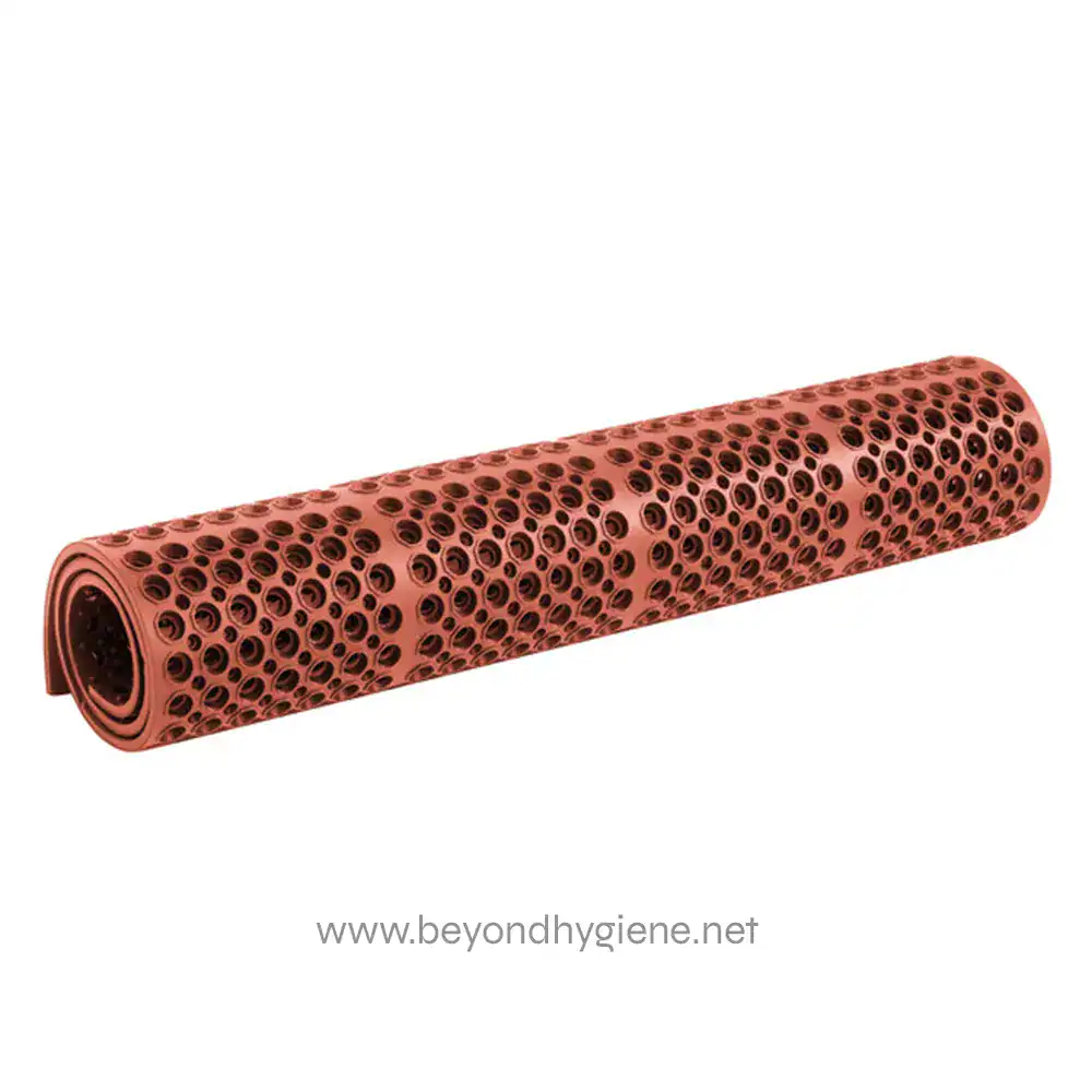 1835240 Blush pink foam hair roller with perforated design for styling and hair care.
