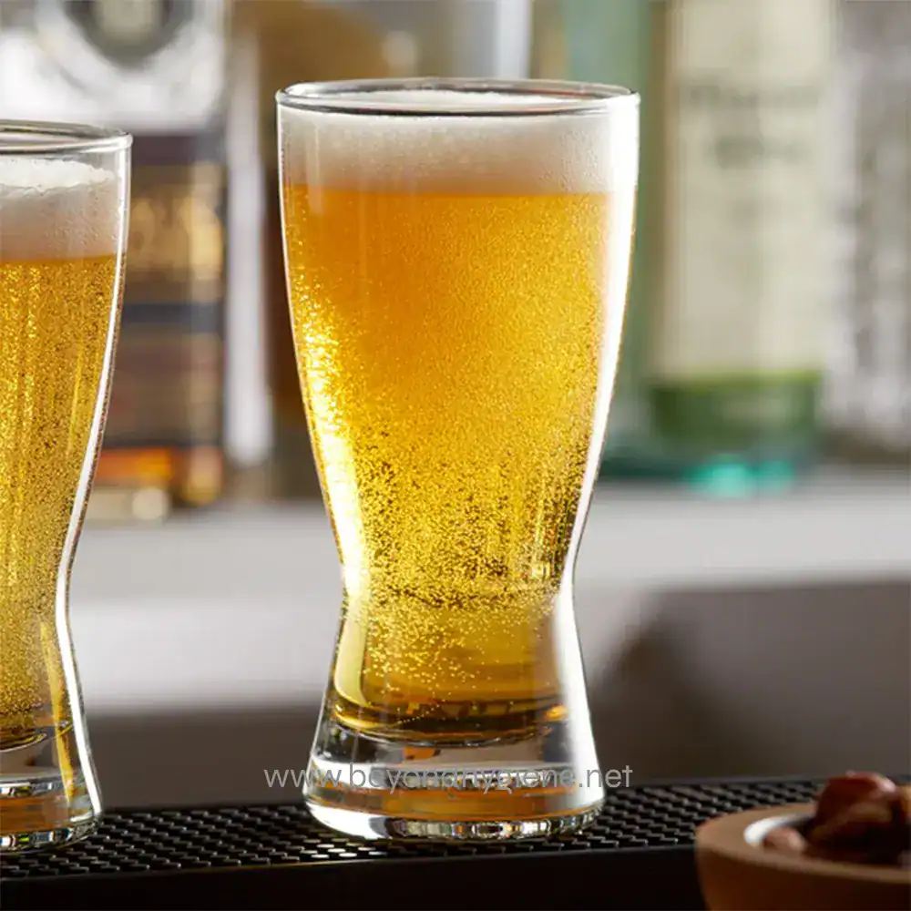 1854948_600x Golden beer in tall glass with foam head, refreshing beverage, served at Beyond Hygiene Asia, emphasizing sanitation and hygiene standards.