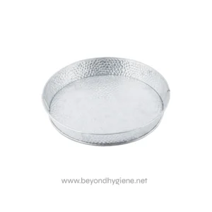 Fresh dark syrup in glass syrup dispenser with metal lid, suitable for breakfast or dessert toppings, with fresh fruit and pastries in the background.